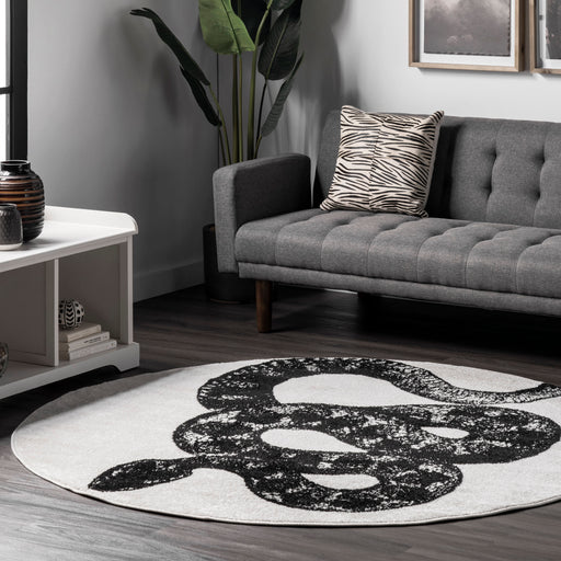 Bold Serpent Pattern Area Rug in Black and Off White