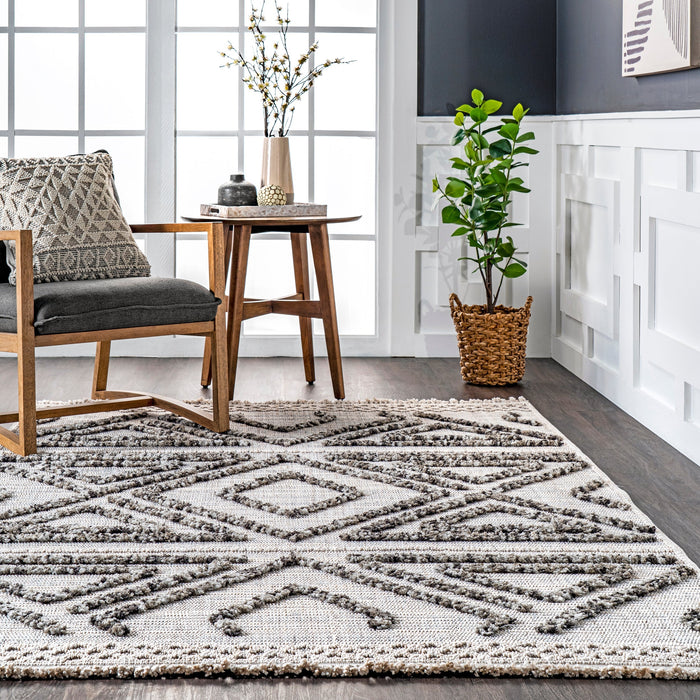 Geometric Textured Area Rug in Light Grey with Tassels
