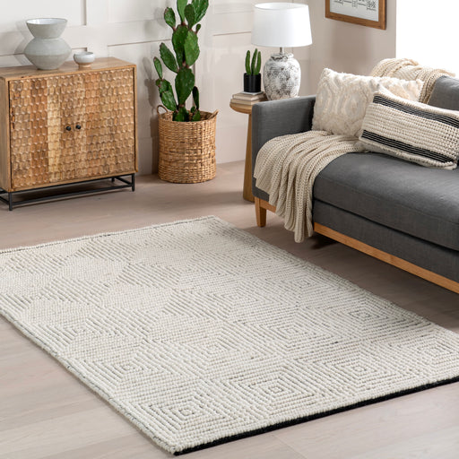 Handmade Ivory Wool Rug with High-Low Design
