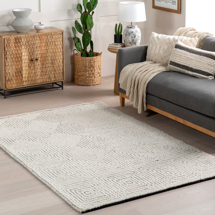 Handmade Ivory Wool Rug with High-Low Design