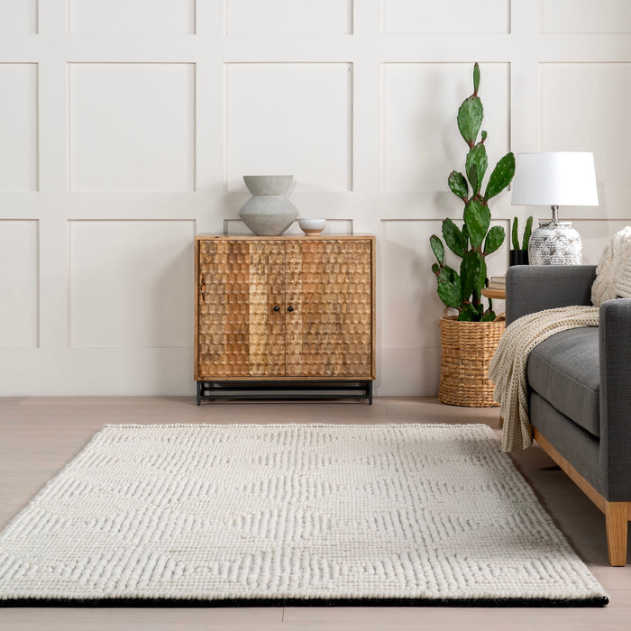 Handmade Ivory Wool Rug with High-Low Design