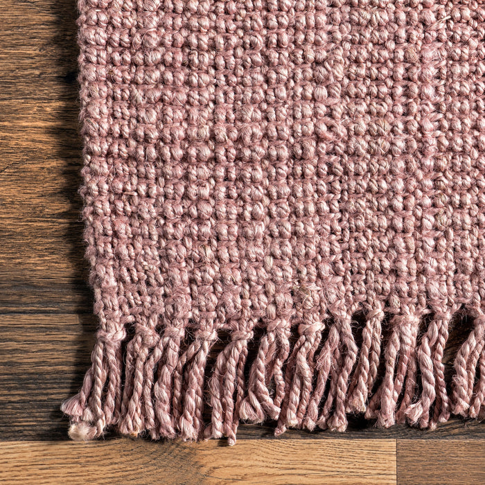 Handgemaakt roze jute vloerkleed met kwastjes 50 cm