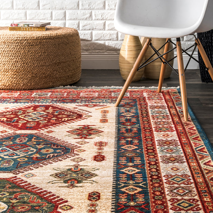 Ivory Fringed Area Rug with Global-Inspired Pattern