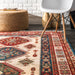 Ivory Fringed Area Rug with Global-Inspired Pattern