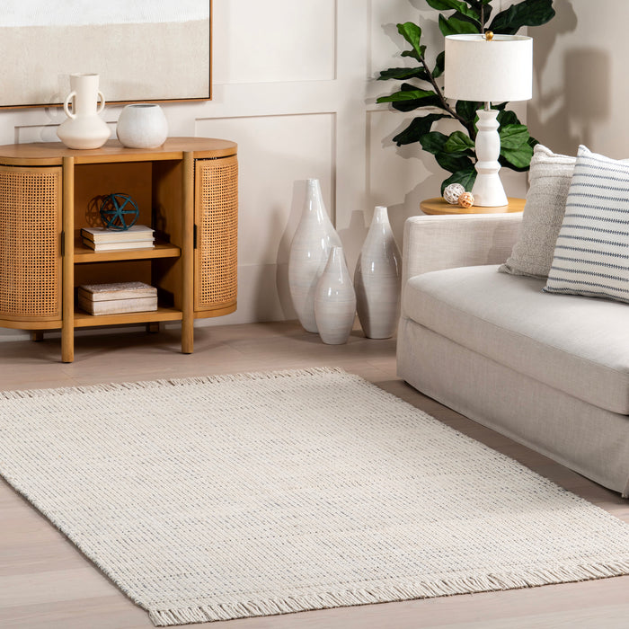 Ivory Solid Wool Fringed Area Rug 140x200 cm