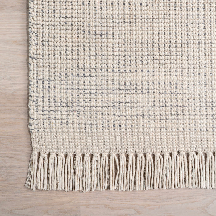 Ivory Solid Wool Fringed Area Rug 140x200 cm