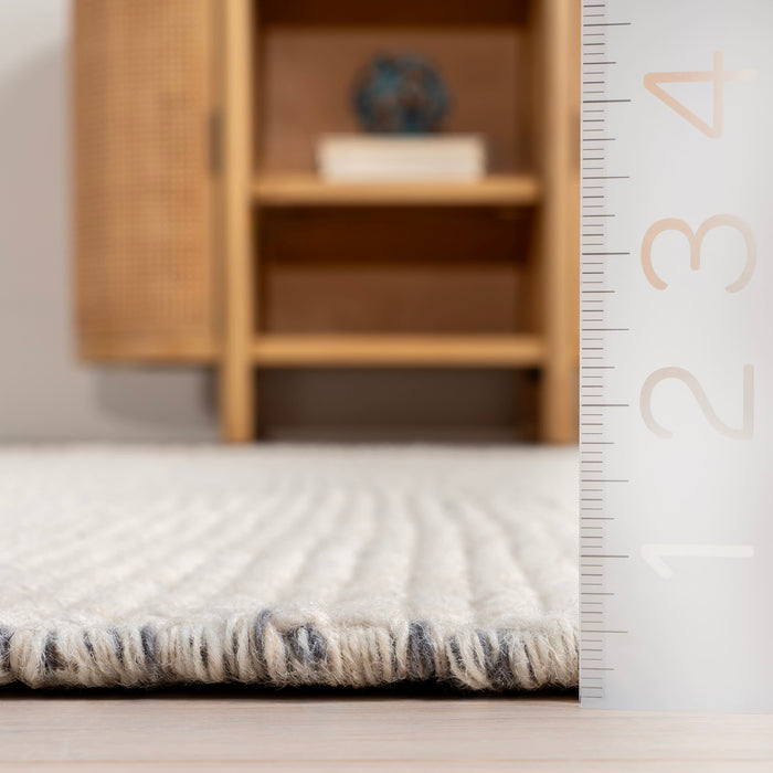 Ivory Solid Wool Fringed Area Rug 140x200 cm