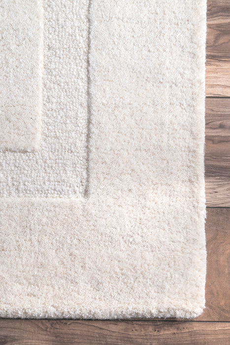 Ivory Wool Area Rug With Double Border Design