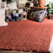 Jute Tasseled Area Rug in Brick Color