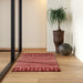 Mandia Wool Striped Area Rug in Brick Red