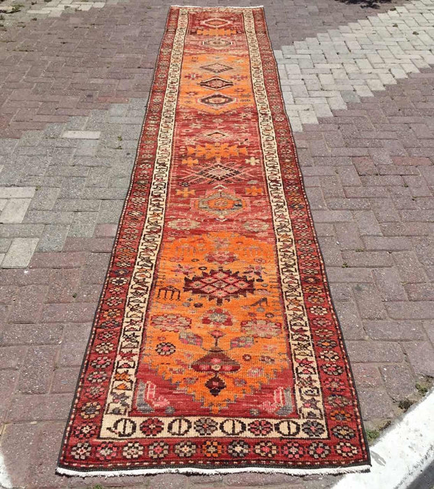 Tappeto runner tribale arancione 465 cm x 83 cm in lana intrecciata a mano