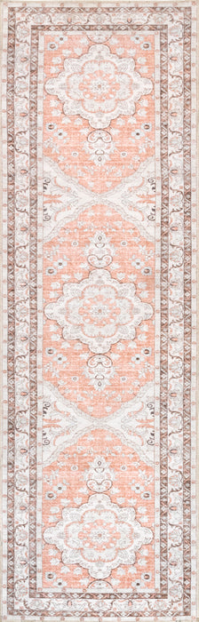 Peach Washable Area Rug With Faded Rosette Design