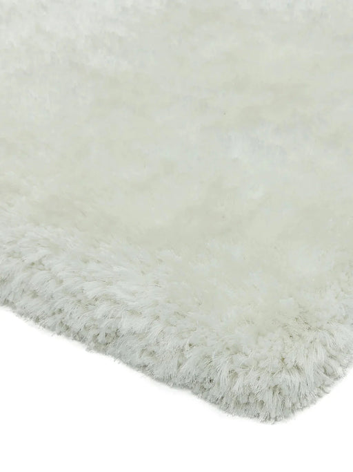 Tappeto bianco peluche