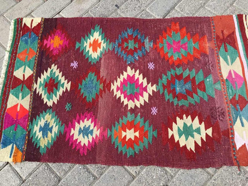 Tappeto vintage Kilim rosso 112 cm x 69 cm tessuto a mano dalla Turchia