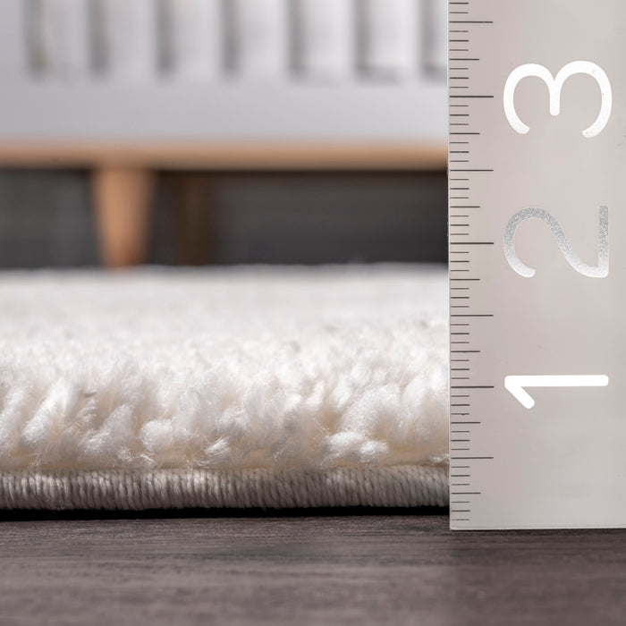 Ruffled Ivory Shag Rug With Tassels And Durable Design