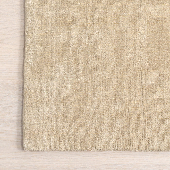 Speckled Wool Blend Area Rug in Sand