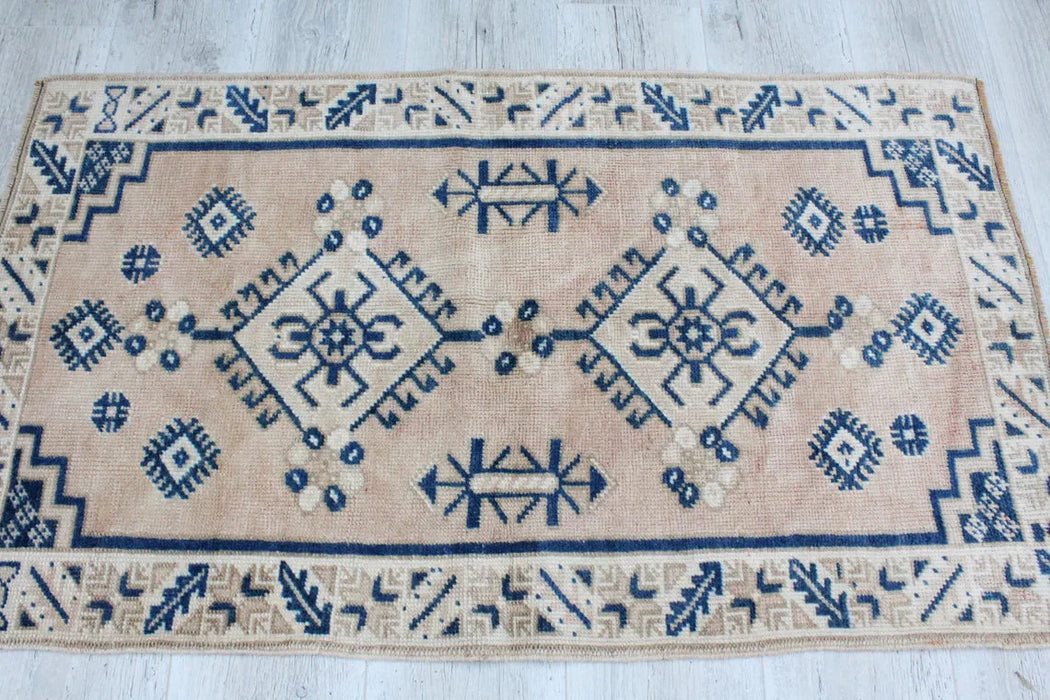 Vintage käsinsolmittu villamatto 71cm x 123cm Isparta Turkey