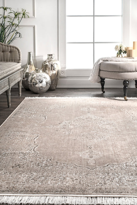 Tappeto con frange di ispirazione vintage in beige