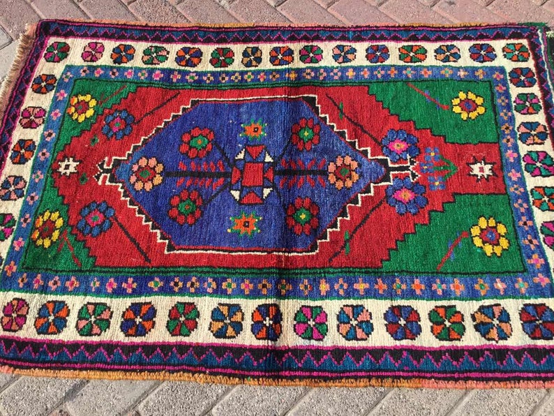 Vintage tribal wollen vloerkleed 138 cm x 95 cm handgeweven Turkije