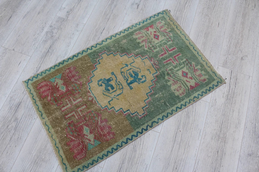 Vintage Turks handgeknoopt wollen vloerkleed 54 x 89 cm